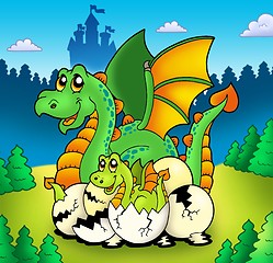 Image showing Dragon mom with baby in forest