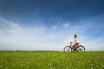 Image showing Riding a bicycle