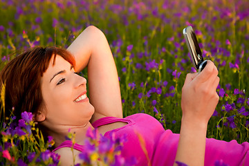 Image showing Girl talking on cellphone