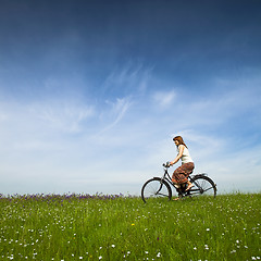 Image showing Riding a bicycle