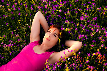 Image showing Lying on flowers