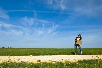 Image showing Hitch hiking girl