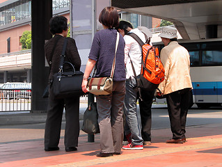 Image showing  Eldery people group waiting for the bus in Japan.
