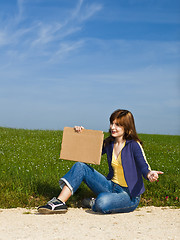 Image showing Hitch hiking girl