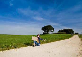 Image showing Hitch hiking girl