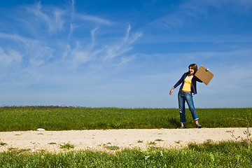 Image showing Hitch hiking girl