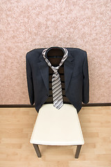 Image showing Clothes on the chair