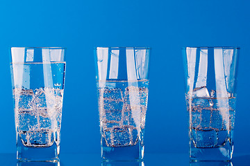 Image showing three glasses with cold water