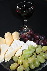 Image showing Cheese,grapes and a glass of wine