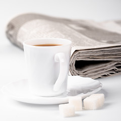Image showing cup of coffee, sugar and newspapers