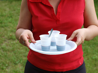 Image showing Barmaid with coffee