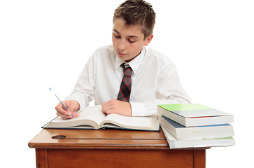 Image showing Conscientious school boy student