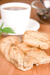 Image showing black tea with herbs and bread