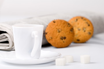 Image showing coffee, sugar, muffins and newspapers