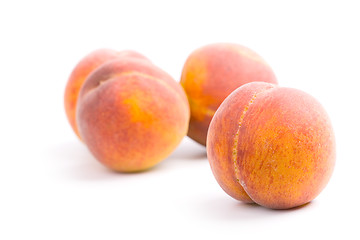 Image showing four peaches