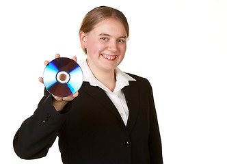 Image showing young woman holding cd or dvd