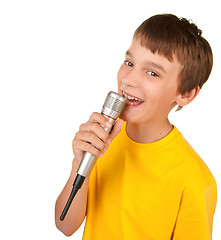 Image showing boy singing into microphone isolated