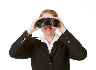 Image showing young business woman isolatedwith binoculars