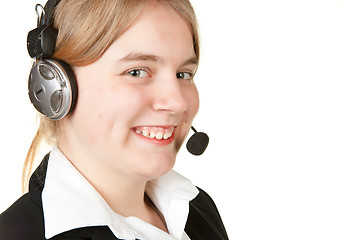 Image showing young business woman with headset  isolated on white