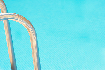 Image showing Pool abstract, ladder railings and copy space on the water