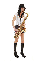 Image showing Chinese girl playing the saxophone.