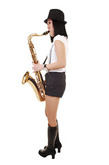 Image showing Chinese girl playing the saxophone.