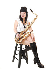 Image showing Chinese girl playing the saxophone.