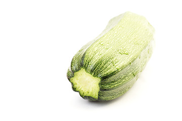 Image showing Single zucchini isolated on white