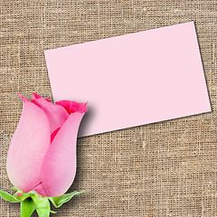 Image showing One pink rose and message-card
