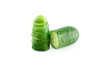 Image showing Half of cucumber and few slices