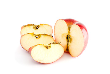 Image showing Red apple half and three pieces