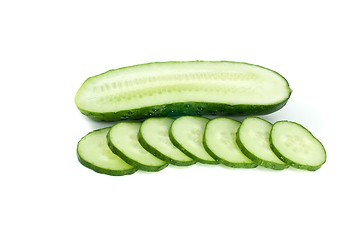 Image showing Half of cucumber and few slices