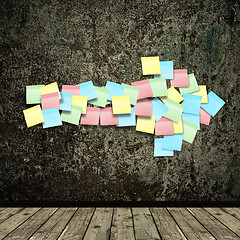 Image showing grunge background with sticky arrow