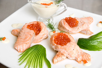 Image showing roasted salmon filet with red caviar