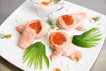 Image showing roasted salmon filet with red caviar