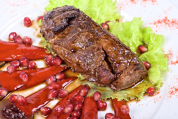 Image showing beef steak with pomegranate