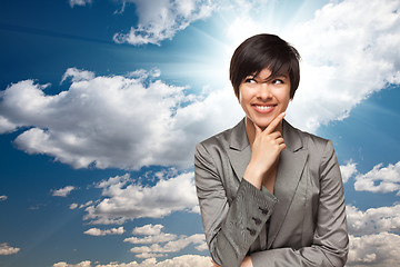 Image showing Pretty Multiethnic Young Adult Woman Over Clouds