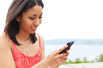 Image showing Woman texting