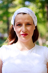 Image showing Beautiful young girl with a bandana smiling