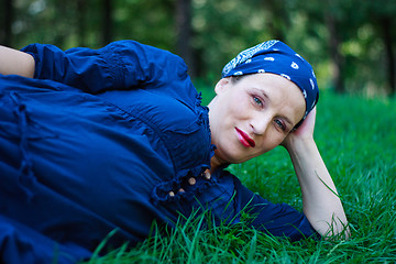 Image showing Beautiful young pregnant woman in nature couched