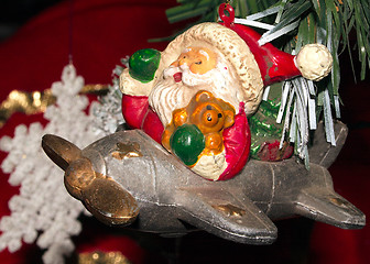 Image showing santa in a plane decoration