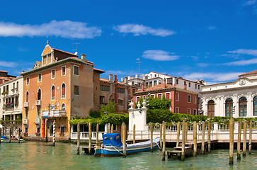 Image showing Colofrul view of Venice canal with old buildings and piers 