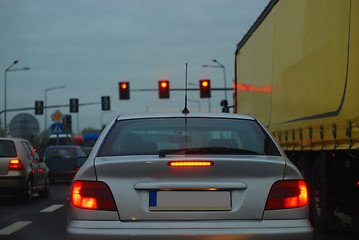 Image showing a car going down the street