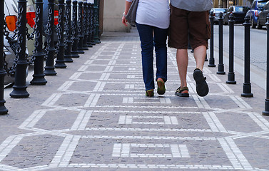 Image showing couple walking on the street 