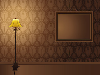 Image showing Vintage Frame hanging on wall with antique lamp.