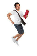 Image showing Ecstatic student jumping
