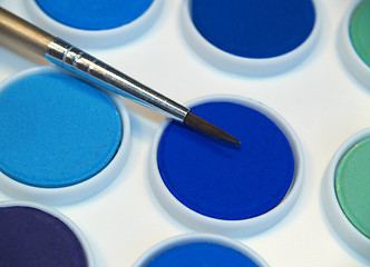 Image showing watercolor paints and brush