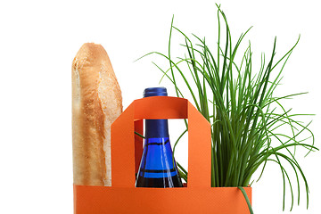 Image showing shopping bag with bread, bottle and greenery