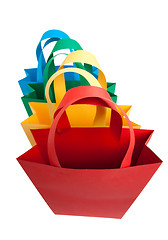 Image showing Four different colors shopping bags