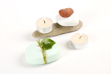 Image showing green soap, candle and colored stones